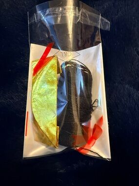 Gold Metallic Crescent Accessory with Black Cord